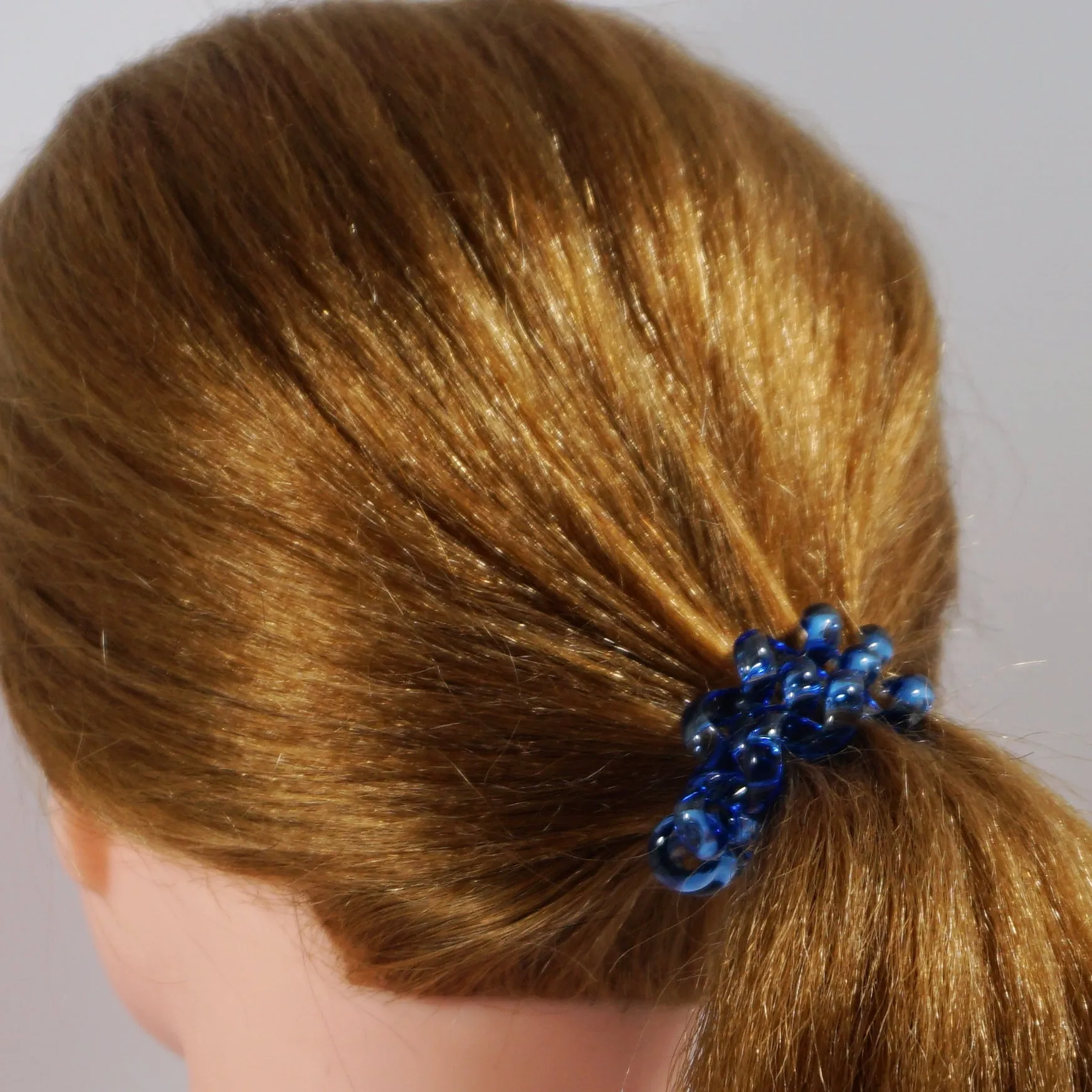 Amelia Beauty Products 8 Large Smooth Elastic Hair Coils, 2. 5in Diameter Thick Spiral Hair Ties, Gentle on Hair, Strong Hold and Minimizes Dents and Creases, Blue