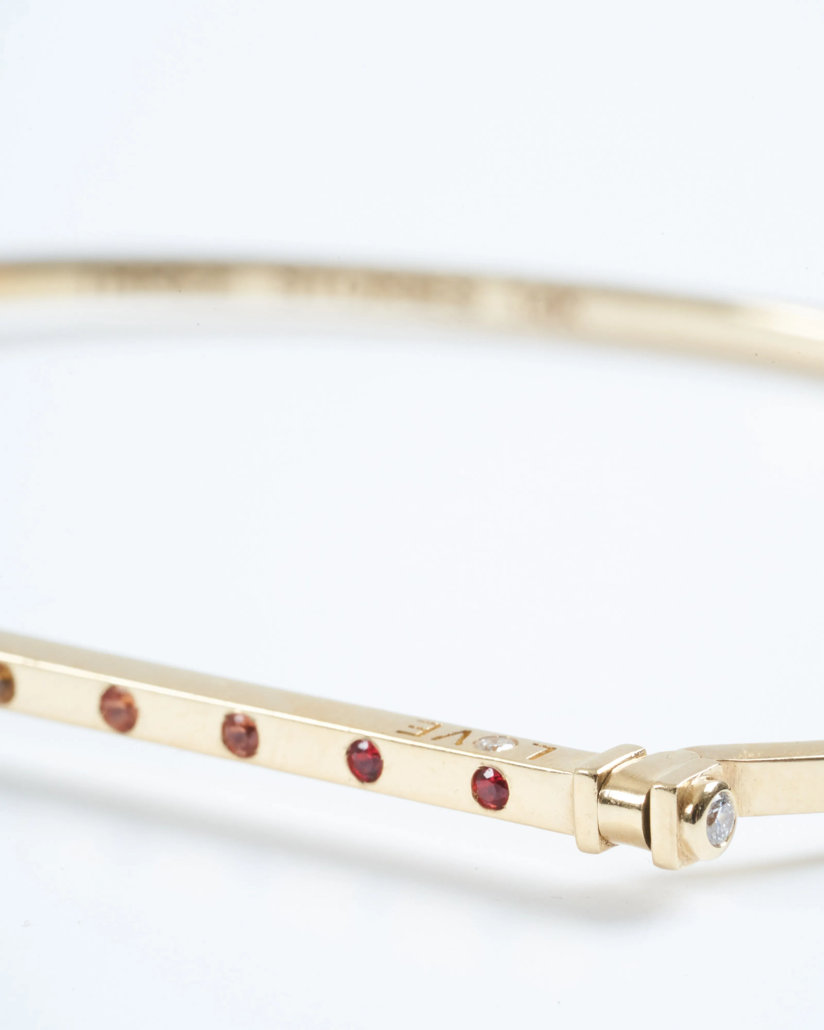 narrow love flip bangle